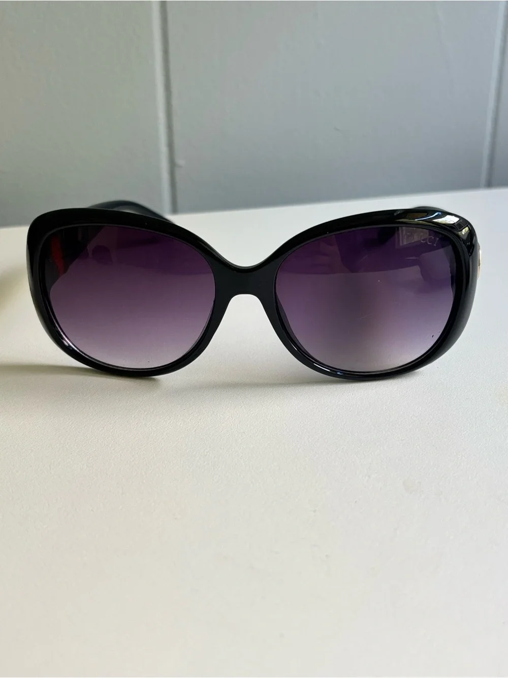 Gucci Black Frame Sunglasses with Purple Gradient Lenses